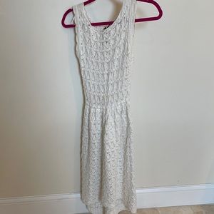 White knit dress from Anthropologie. Cute bow in the back.